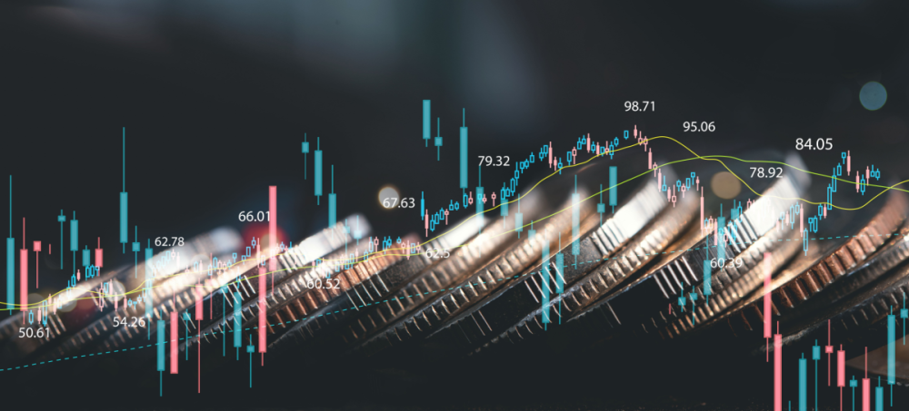 Financial chart trending upward with coins in the background
