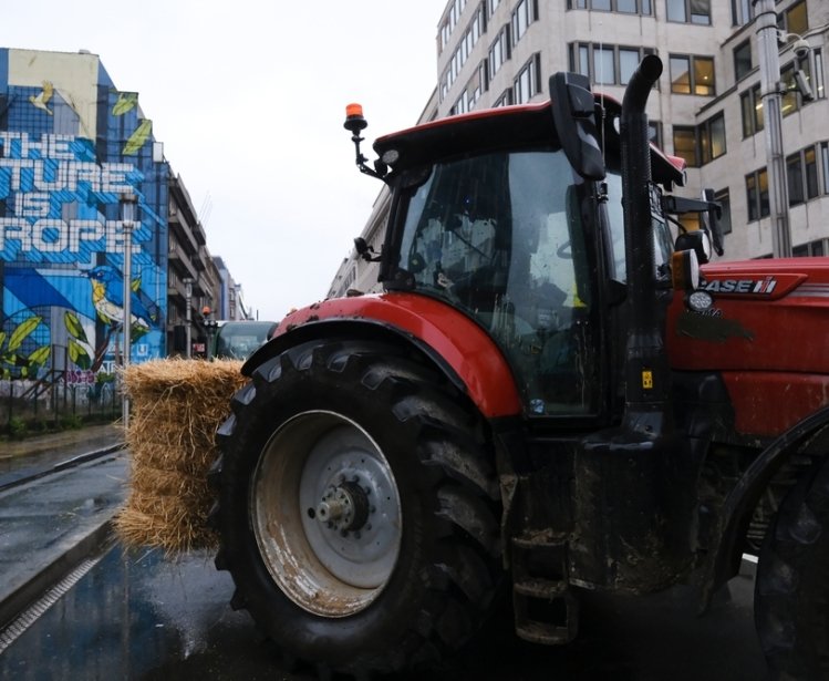 Farmers use tractors during a protest of European farmers over price pressures, taxes and green regulation, on the day of an EU Agriculture Ministers meeting in Brussels, Belgium, February 26, 2024.