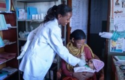 Mother and newborn attending a routine health care visit in Ethiopia.