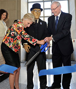 Former Ambassador Joseph Gildenhorn, Wilson Center President & CEO Jane Harman and “Woody” cut the ribbon.