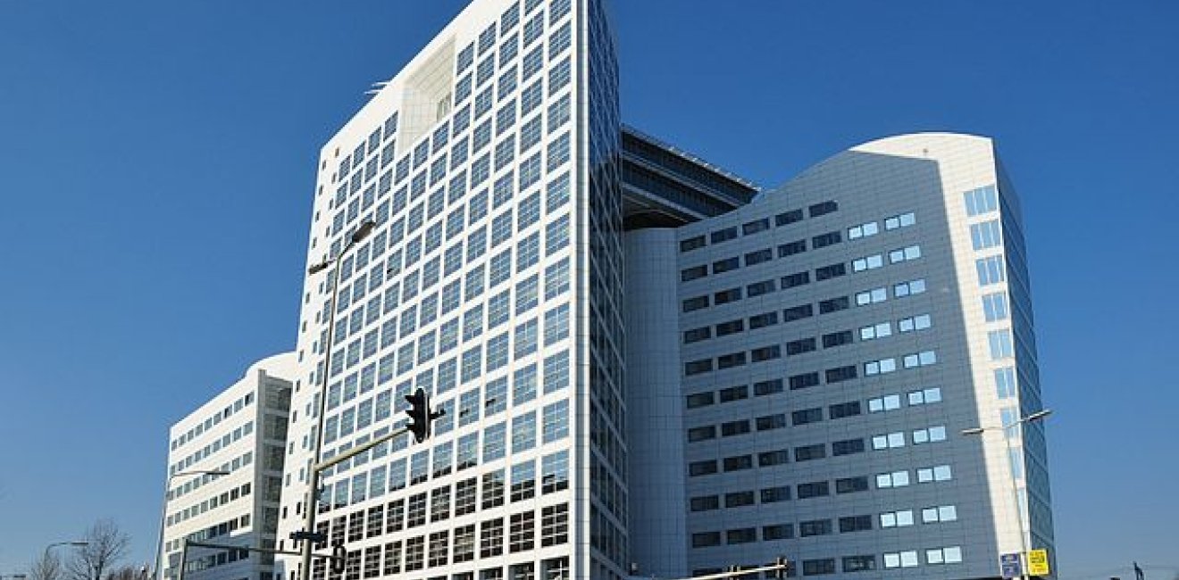 The International Criminal Court building looms over The Hague, Netherlands. Photo by Vincent van Zeijst, via Wikimedia Commons. Creative Commons.