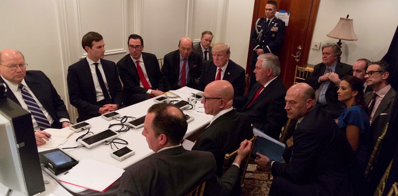 U.S. President Donald Trump is shown in an official White House handout image meeting with his National Security team and being briefed by Chairman of the Joint Chiefs of Staff General Joseph Dunford via secure video teleconference after a missile strike on Syria while inside the Sensitive Compartmented Information Facility at his Mar-a-Lago resort in West Palm Beach, Florida, U.S. April 6, 2017. 