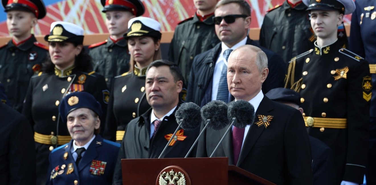 President Putin surrounded by military officers