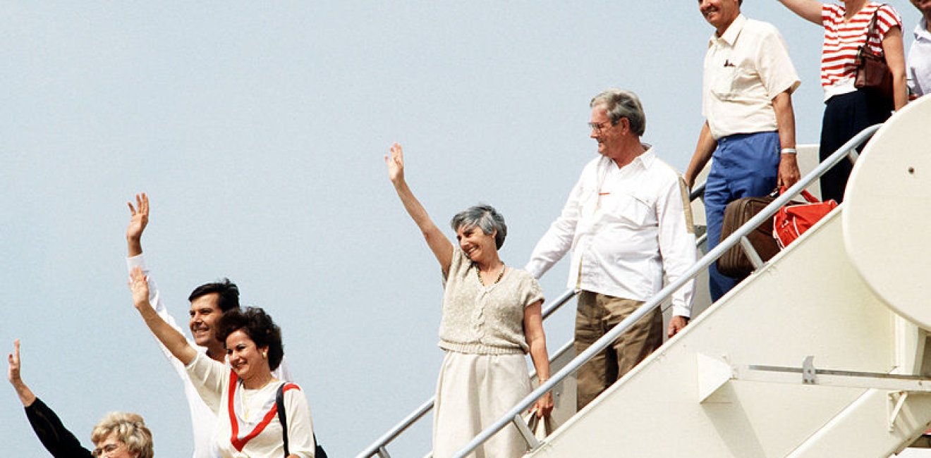 TWA hostages wave upon returning to the United States in 1985.