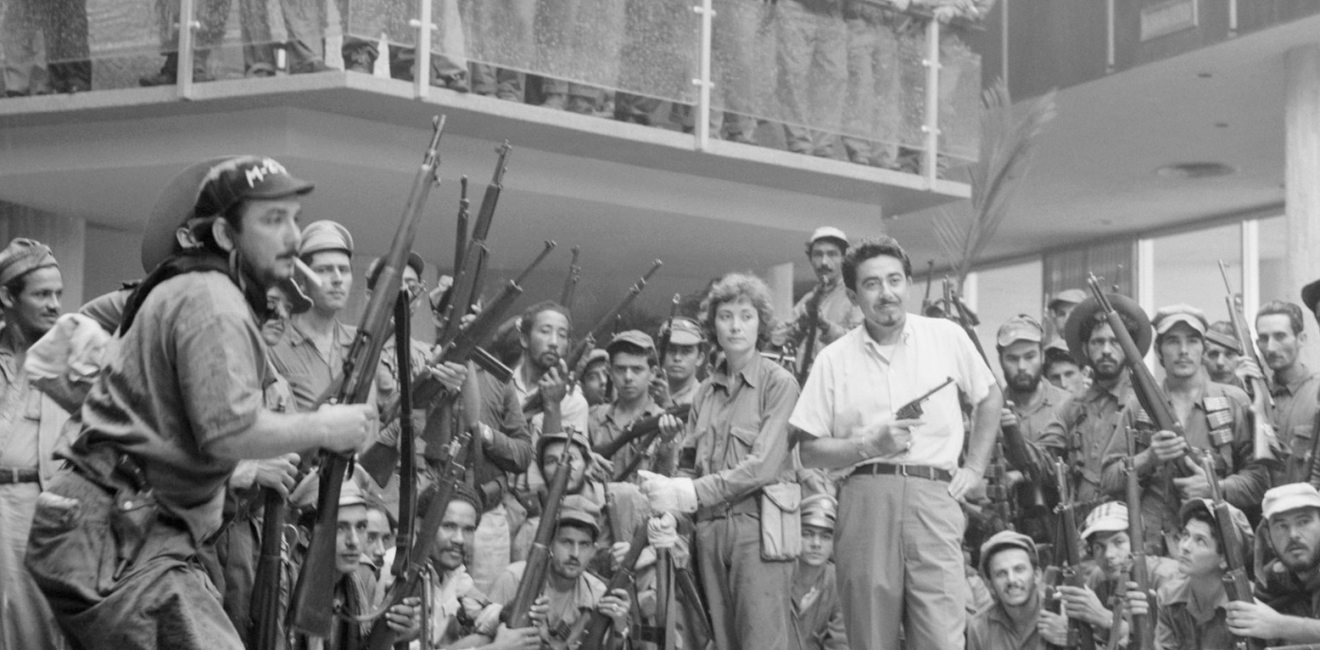 Cuban revolution soldiers in the lobby of the Havana Hilton