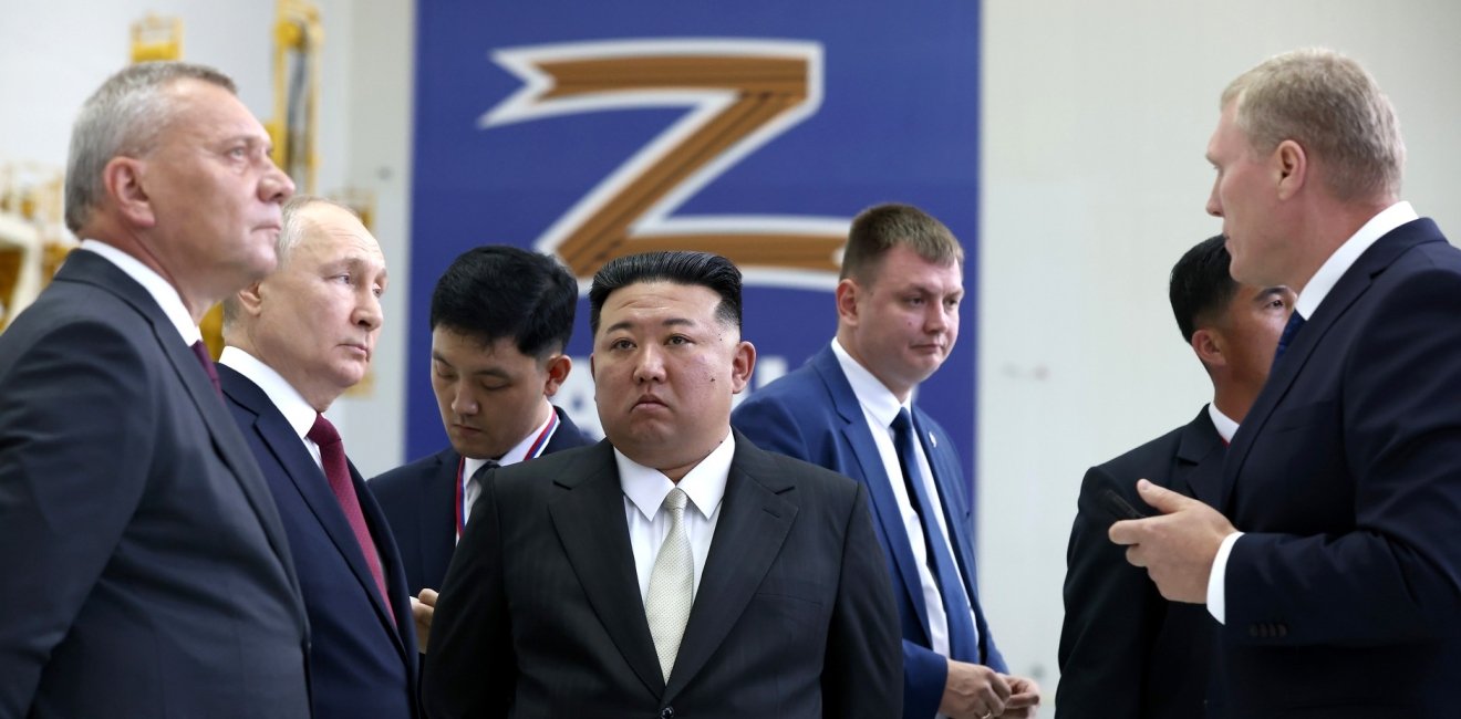 With Chairman of State Affairs of the DPRK Kim Jong-un (center) during an inspection of the Vostochny Cosmodrome. Explanations are given by the head of Roscosmos Yuri Borisov (left) and the general director of the Center for the Operation of Ground-Based Space Infrastructure Nikolai Nestechuk (right).