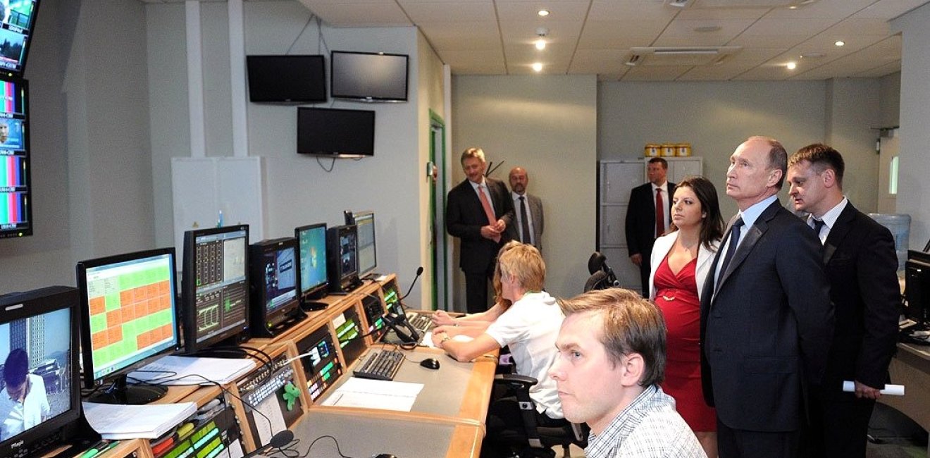 Vladimir Putin visits the Russia Today television studio