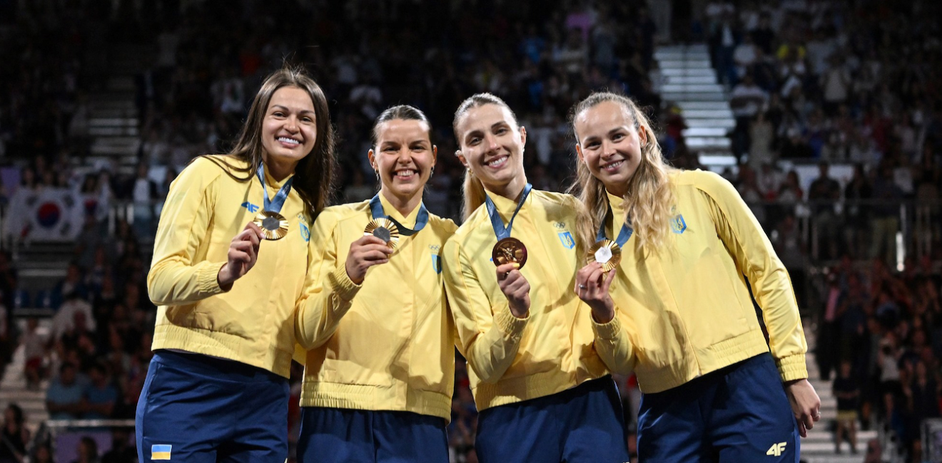 Gold medalists Olena Kravatska, Alina Komashchuk, Olga Kharlan and Yuliya Bakastova during the victory ceremony for the women's team sabre event at the Grand Palais during the 2024 Summer Olympics.