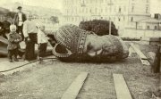 Historical photo of a toppled statue 