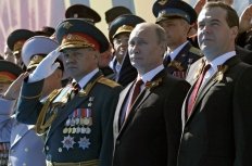 Sergey Shoigu, Vladimir Putin and Dmitry Medvedev at the military parade marking the 69th anniversary of Victory in the Great Patriotic War.