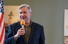 Sen. Sheldon Whitehouse speaks into a microphone