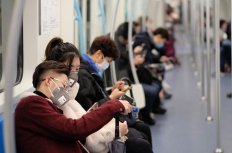 People wearing masks on Shanghai subway