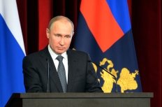 Vladimir Putin with flags behind