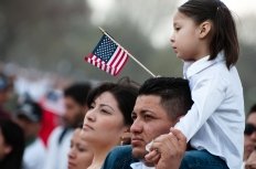 Small girl holding USA flag