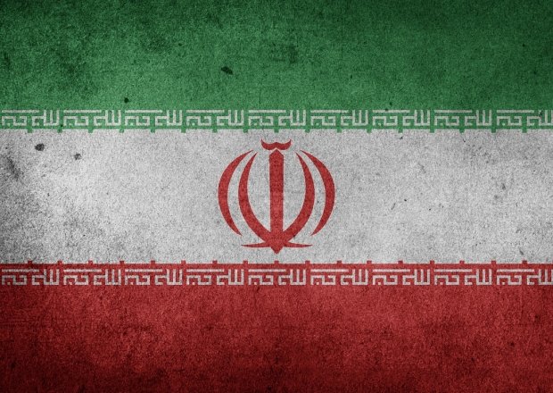 Iranian flag on a dark background