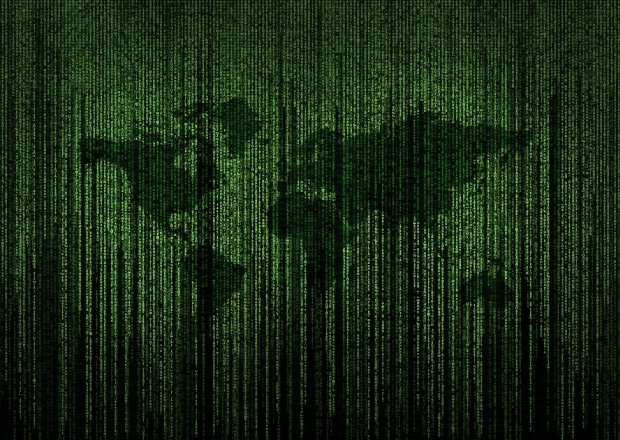 Green world map with binary code