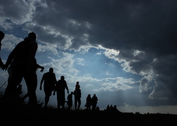 Silhouettes of migrants