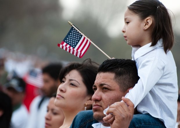 Small girl holding USA flag