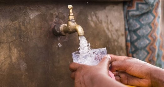 Cup being filled at fountain
