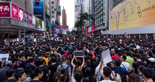 Hong Kong protesters marching against the Extradition Bill in July 2019.
