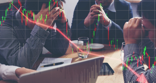 Business team in background of downward trending arrow