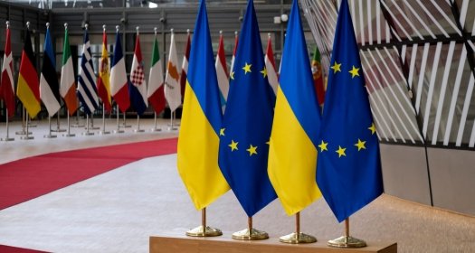EU and Ukraine Flags on a Podium