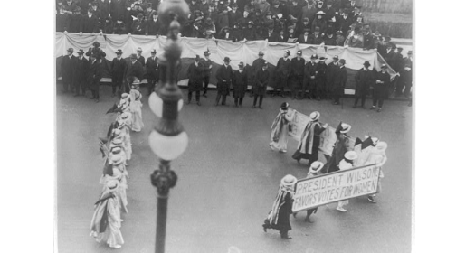 Suffragettes parading with banner "President Wilson favors votes for women". N.Y.C. , ca. 1916. Photograph. https://www.loc.gov/item/2001704196/.