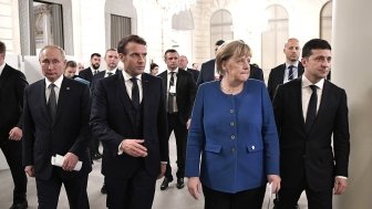A press conference with Vladimir Putin, Emmanuel Macron, Angela Merkel, and Volodymyr Zelenskyy following the Normandy Format