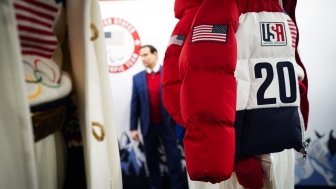 Marco Rubio looking at Team USA uniforms