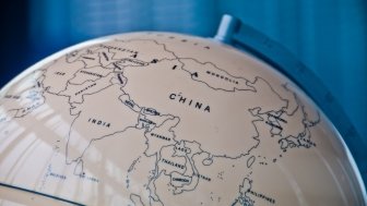 A globe that is turned to Southeast Asia