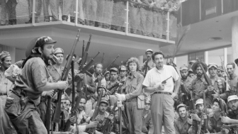 Cuban revolution soldiers in the lobby of the Havana Hilton