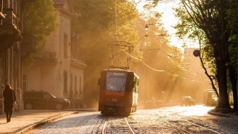 Old orange tram in backlight. Lviv (Lvov), Ukraine