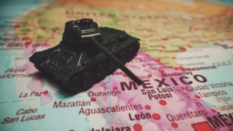 Toy tanks on the map. War on drug cartels in Mexico.