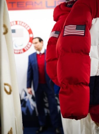 Marco Rubio looking at Team USA uniforms