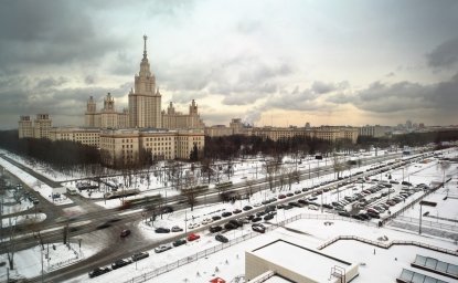 Main building of Moscow State University at winter in Moscow, Russia, view through window