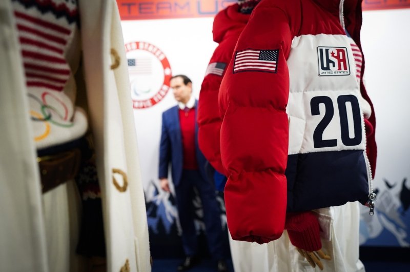 Marco Rubio looking at Team USA uniforms