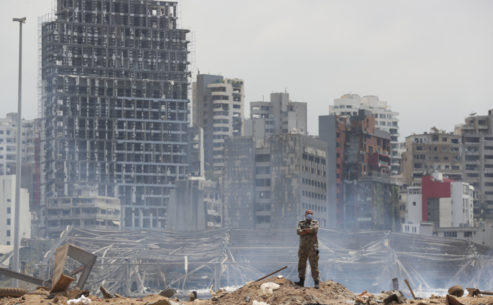 A soldier stands at the devastated site of the explosion in the port of Beirut, Lebanon,
