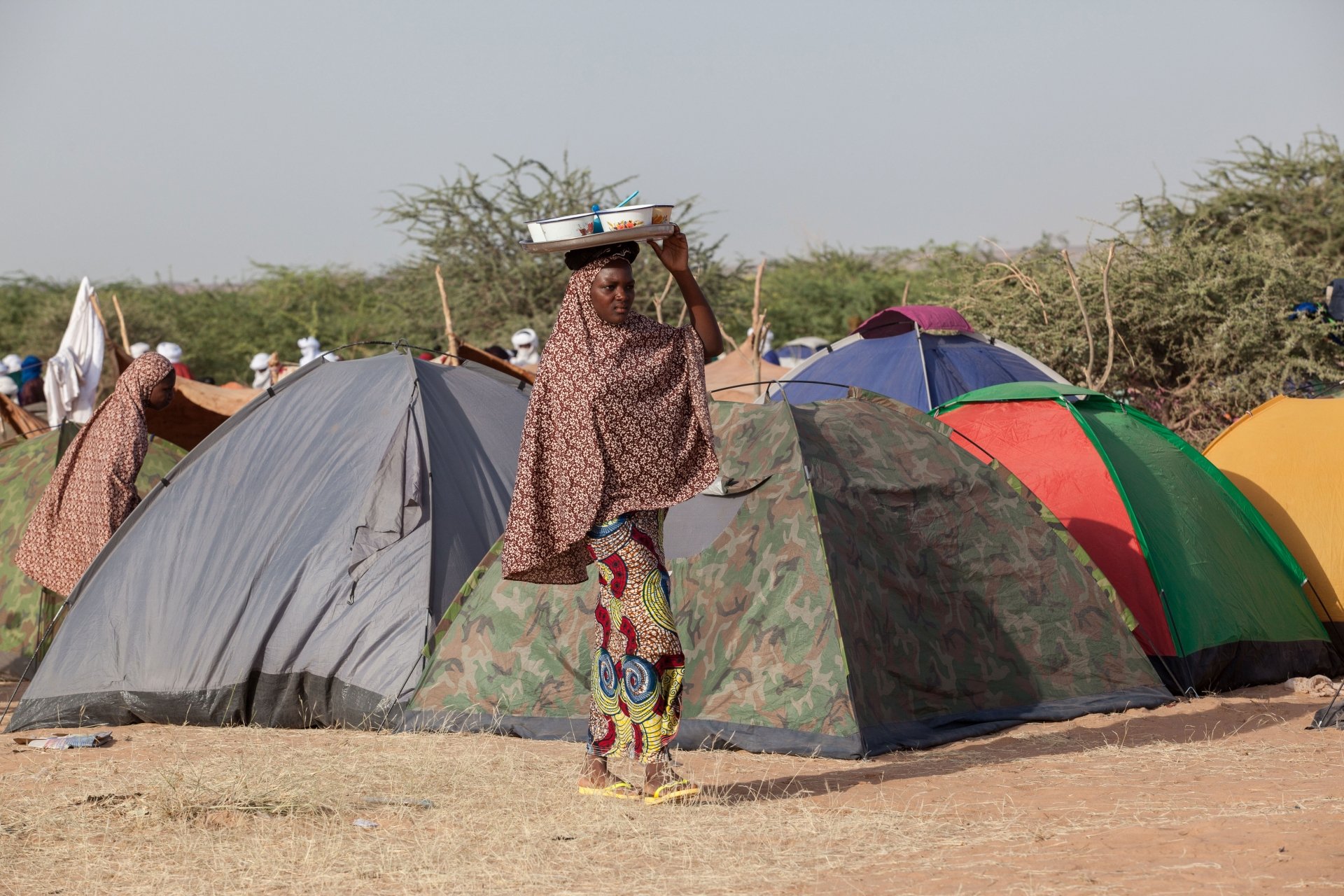 Woman Carrying Food