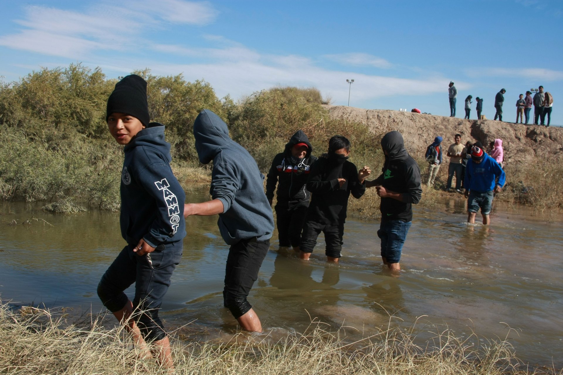 Migrants crossing the Rio Grande