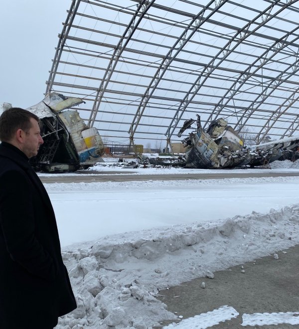 Estonian Secretary General for the Ministry of Foreign Affairs Jonatan Vseviov surveys damage from Russian military attacks at Antonov Airport in Hostomel, Kyiv Oblast, Ukraine