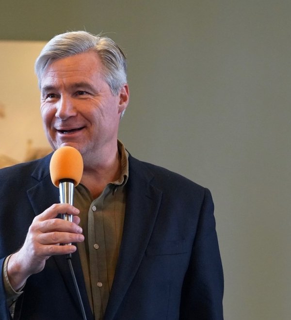 Sen. Sheldon Whitehouse speaks into a microphone