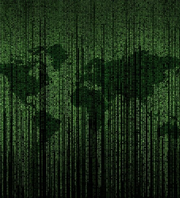 Green world map with binary code