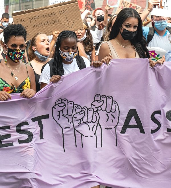 image - women protesting holding sign