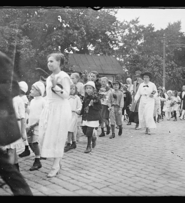 Children of Riga marching to the railway station of Riga