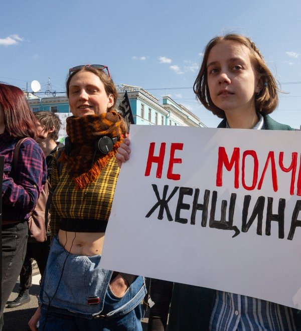 Participants at a women's march with the poster "Do not be silence, woman!" - St. Petersburg, 2019