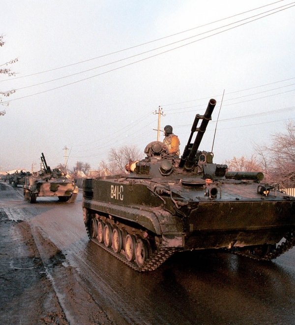 A column of Russian army armor makes its way south from a Russian army base towards the front lines of Chechnya on January 12, 2000 in Mozdok, Russia
