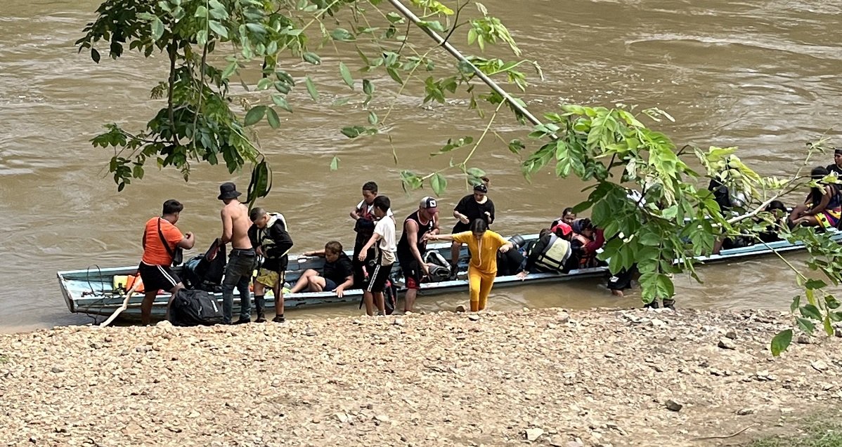 Migrants departing boat