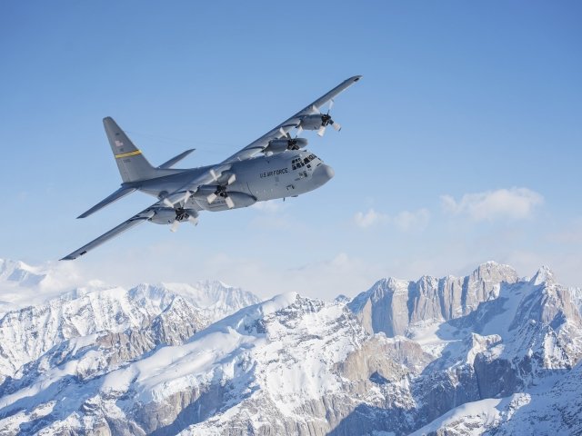 A C-130 Hercules, from Alaska Air National Guard’s 144th Airlift Squadron, flies over Denali National Park and Preserve, Alaska, March 4, 2017. 