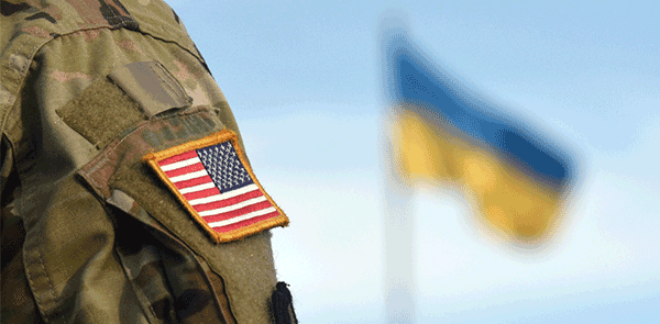 US Soldier with Ukrainian flag in background