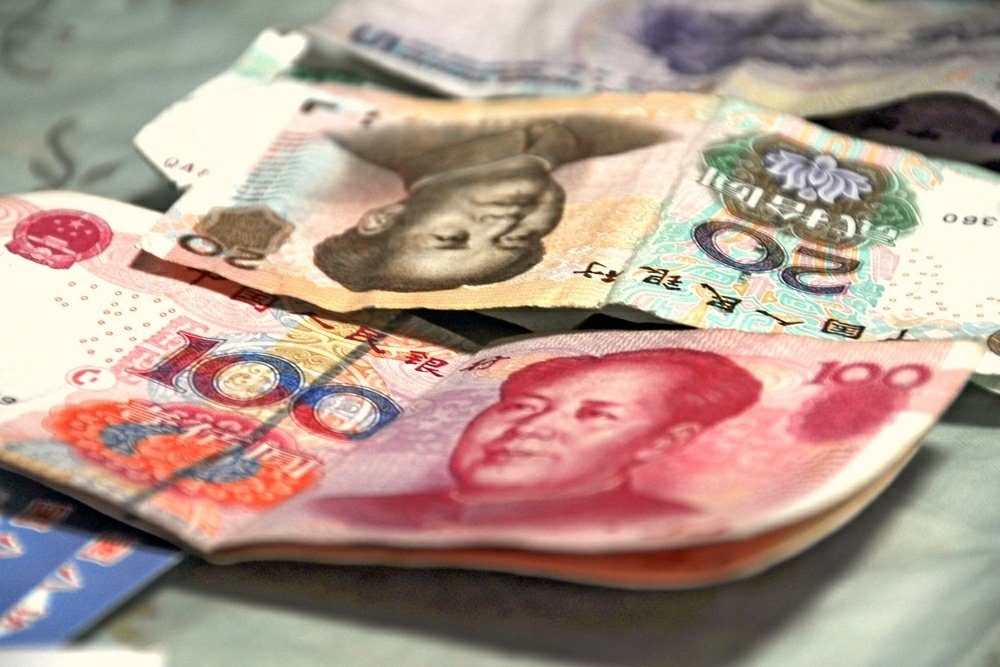 Why doesn't China directly increase RMB usage in International Trade? (中文)